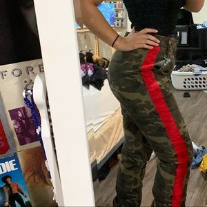 camo pants with a red flare